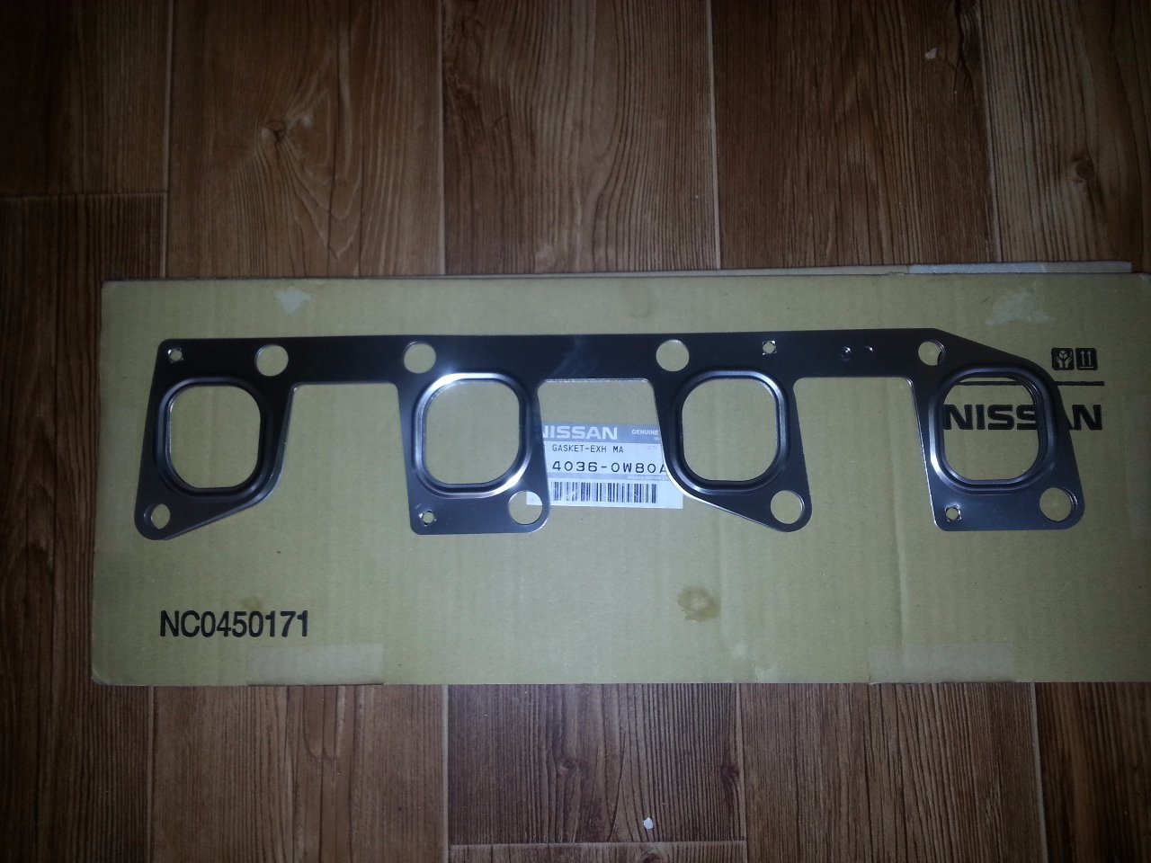 Прокладка выпускного коллектора NISSAN 14036-0W80A TD27-TI, QD32